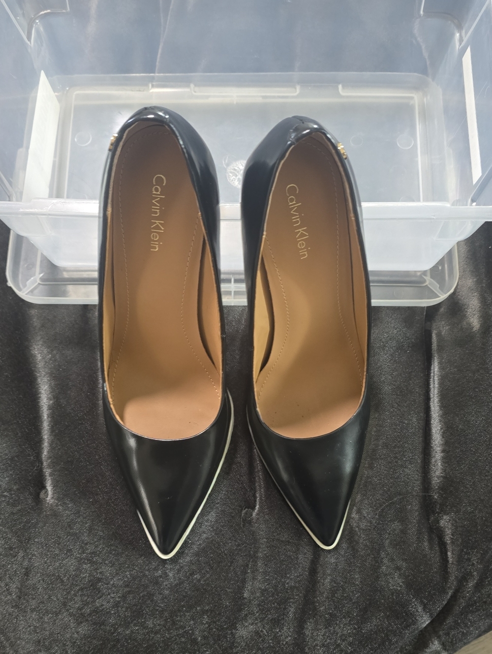 Calvin Klein Black Pointed Toe Pumps with White Edge